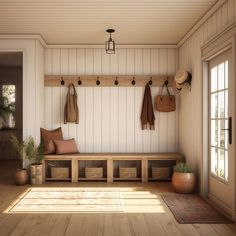 a wooden bench sitting in the middle of a room next to a door with hooks on it