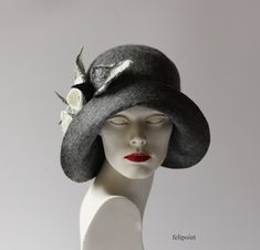 I made the Mrs Fisher style hat by hand, entirely from the highest quality merino wool. Beautiful shades of gray color of the hat.   The hat is soft, very pleasant to the touch, nicely placed on the head.  Special and unique ! Sophisticated and elegant ! I can make this hat in other colors and sizes. Made just for you  All my works are made by hand  in the process of long-term, hand felting My products are unique, designed by me, always made from the finest materials. I hope that they will give you a lot of joy.  Thank you for visiting my shop:-) My other hats you can find here: https://www.etsy.com/shop/Feltpoint?ref=hdr_shop_menu&section_id=17484098   Images and all content: FELTPOINT. I save my ideas and designs by copyright.  All Rights Reserved. Gray Fitted Felt Hat For Winter, Gray Felt Hat For Winter, Elegant Gray Hat With Short Brim, Elegant Gray Felt Hat With Short Brim, Elegant Gray Fedora For Winter, Elegant Gray Brimmed Felt Hat, Elegant Gray Wide Brim Felt Hat, Fitted Gray Wool Hat, Elegant Gray Felt Hat With Curved Brim