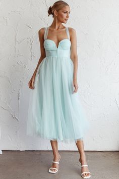 Mint midi dress Lined Boning in bodice Tulle mesh skirt Lace-up back Zipper in back You'll feel like a princess in our Surreal midi dress. Perfect for a wedding or special occasion where you need to look like literal royalty. We are obsessed with its floaty tulle skirt and stunning, lace-up back. Team it with diamante heels and a clutch for a look that'll have Prince Charming lost for words. MODEL INFO Model is wearing size XS Height: 5'8" Bust: 32" Waist: 25" Hips: 35" SIZE INFO Flat garment me Pale Green Dress, Mint Midi Dress, Lost For Words, Selfie Leslie, Tulle Midi Dress, Yellow Bridesmaids, Red Bridesmaids, Dress Mint, Mesh Skirt