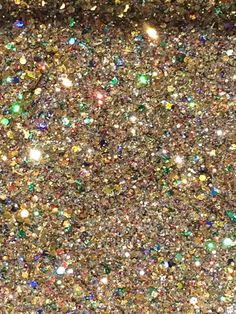 the glitter is all over the ground and it looks like there are many different colors