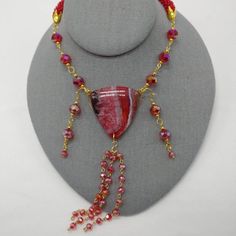 Check out this item in my Etsy shop https://www.etsy.com/listing/872670940/red-beadsspiral-bead-crochettassel Handmade Red Beaded Lariat Necklace, Adjustable Beaded Necklace With Czech Glass Dangling Beads, Adjustable Dangle Crystal Necklace With Faceted Beads, Unique Adjustable Necklaces With Faceted Beads, Unique Adjustable Necklace With Faceted Beads, Red Bohemian Lariat Necklace, Adjustable Czech Glass Necklaces With Dangling Beads, Adjustable Czech Glass Necklace With Dangling Beads, Adjustable Dangle Glass Necklace