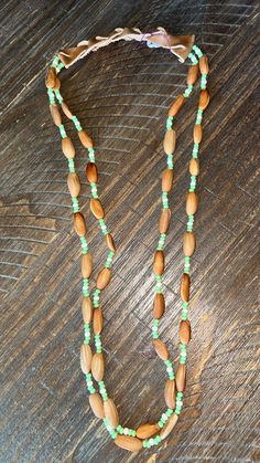 Handmade by Northern California Maidu Native American with local pine nuts. Handmade Beaded Necklace, Handmade Beaded Necklaces, Pine Nuts, Northern California, Nuts, Nativity, Native American, Beaded Necklace, Jewelry Necklaces