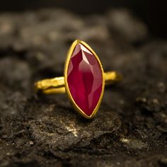 Gold Ruby Hammered Ring | Minimalist Stacking | 925 Sterling Silver 24K Gold Plated | Birthstone Jewelry | Delicate Ruby Ring Handcrafted hammered Silver Ring Our shop offer free ring sizing and color options.(Oxidized(Black),Gold Plated) Metal : 925 Sterling Silver Gemstone :Lab Emerald Gem Size : 15 X 8 mm Band Size : 2 mm Ring Weight : 3.5 grams Ring Size : US 6 (The size you want is made for free). (We used the US standard sizing) **Custom Orders is Made** As pellada family, we will be happy 22k Gold Ruby Ring Gemstone For Gift, 22k Gold Ruby Gemstone Ring As Gift, Gold Ruby Ring With Bezel Setting In Sterling Silver, Hammered Jewelry, Ruby Bands, Matching Wedding Rings, Green Emerald Ring, Jewelry Delicate, Hammered Silver Ring