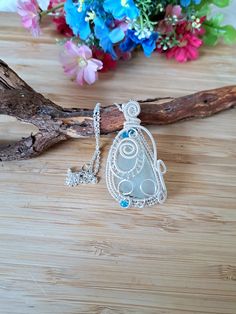 Silver Wire Wrap Sea Glass necklace, Beach Glass necklace, Handmade Boho necklace, Sea Glass Jewellery, Women's present, Unique Gift for Her  Beautiful piece of Natural Aqua Sea Glass pendant, wrapped on Silver plated wire, Blue Crystal beads & 925 Silver plated chain 18" 💝 This item is perfect gift idea for the Loved ones or for yourself, for Birthdays and any other special occasions.   The necklace come with gift bag ❤ FIND US: FACEBOOK at: www.facebook.com/foxjewelleryshop INSTAGRAM: www.ins Unique Nickel-free White Necklace, Unique White Nickel-free Necklace, Wire Wrapped Pendant Necklaces As Gifts, Wire Wrapped Round Pendant Necklace As Gift, Wire Wrapped Pendant Necklace As Gift, Wire Wrapped Pendant Necklace For Gift, Wire Wrapped Amulet Necklaces As Gift, Wire Wrapped Amulet Necklace As Gift, Wire Wrapped Amulet Necklace For Gift