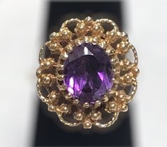 VINTAGE AMETHYST 14K YELLOW GOLD FILIGREE RING Beautifully crafted in 14k yellow gold, this 3CT Oval cut Amethyst Solitaire Ring is sure to please! This item is vintage and in excellent condition.  It is sure to be one of your favorite pieces!      Purple Vivid Hue     4.7 Grams  Shipped insured/delivery confirmation I guarantee item to be exactly as described and pictured. Yellow Gold Oval Estate Rings, Estate Style Oval Yellow Gold Rings, Estate Style Oval Gold Jewelry, Estate Oval Ring Stamped 14k, Oval Yellow Gold Estate Rings, Victorian Oval Amethyst Ring With 17 Jewels, Estate Style 14k Gold Oval Jewelry, Yellow Gold Amethyst Ring Stamped 14k, Collectible 14k Yellow Gold Amethyst Ring