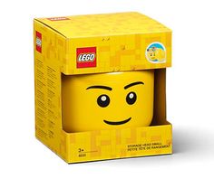 a yellow box with a smiley face on it's lid and the inside is empty