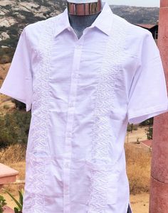 ELEGANT GUAYABERA 100% LINEN! WHITE color, with white silk thread beautiful and elegant embroidery. This GUAYABERA is a must in any man's closet! Casual Pueblo shirt, is by artisans in Mexico 30 % linen 70 % Cotton Short Sleeve Two front bottom pockets Open bottom hem for more comfortable wear This is the perfect guayabera for any occasion! Vacation Wedding, Casual Dress Shirt, Shirt Elegant, Men Closet, Elegant Embroidery, Linen White, Shirt Dress Casual, Front Bottoms, Silk Embroidery