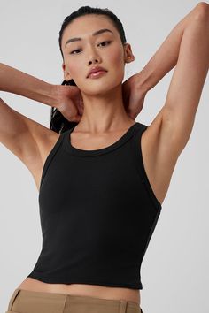 The name says it all: The Goddess Ribbed Go-To Tank fits like your best basic tank, with a racerback and cropped hem—but it’s made from a buttery-soft, ribbed performance fabric that’s perfect for practice. Layer it over a sports bra for movement, then pair it with trousers for an effortless street-style look. Sporty Ribbed Cropped Tank Top, Black Ribbed Racerback Tank Top, Black Ribbed Racerback Crop Top, Ribbed Racerback Crop Top, Alo Yoga Ribbed Athleisure Top, Black Ribbed Cropped Tank Top, Black Ribbed Tank Top For Yoga, Alo Yoga Sleeveless Summer Tank Top, Alo Yoga Summer Sleeveless Tank Top