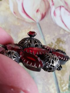 This is a vintage red, glass rhinestone and steel cut brooch. My best guess is that this is from the 1940s. I think it may be older however. It is really a stunning piece. The brooch measures about 2 inches across. Don't forget to stop in at my other Etsy shop... http://www.etsy.com/shop/xtdesigns. Follow me on Twitter at... MyYiayiaHadThat@MyYiayiaHadThat. If you have a wish list or are looking for something specific, please ask. I may have exactly what you are looking for. As always please con Vintage Red Wedding Brooches, Antique Red Brooch As Gift, Antique Red Brooches As Gift, Antique Red Brooches As A Gift, Antique Red Brooches For Gift, Mattel Barbie, Red Rhinestone, Red Glass, Wish List