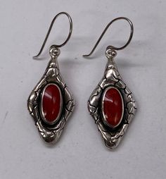 "Gorgeous Vintage Art Deco Bali Sterling Silver Red Coral Teardrop Dangle Earrings good pre/owned condition measures 1.5\" X 1/2\" width." Red Handmade Drop Earrings, Handmade Red Earrings For Formal Occasions, Nickel Free Red Drop Earrings, Red Long Drop Earrings With Ear Wire, Vintage Red Sterling Silver Earrings, Red Vintage Sterling Silver Earrings, Red Teardrop Earrings For Formal Occasions, Red Formal Pierced Earrings, Red Pierced Earrings For Formal Occasions