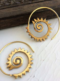 large hoops,  spiral earrings in brass; gold (brass)or silver (brass and siver)  colors;  tribal ethnic style; boho;gypsy;  30mm; Handmade Spiral Metal Hoop Earrings, Spiral Earrings For Festivals, Spiral Ear Wire Earrings For Festival, Bohemian Gold Hand Forged Hoop Earrings, Nickel-free Spiral Brass Jewelry, Bohemian Brass Jewelry With Sun Design, Bohemian Spiral Nickel-free Hoop Earrings, Festival Spiral Gold Earrings, Gold Spiral Bohemian Earrings