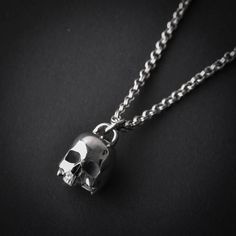 A handmade sterling silver 925 large half skull necklace.Chain Lenght: 80cm (if you would like a different length please state so in "note to seller".)Skull Measurements: Skull Hight-Approx 21.18mm | Skull Width-Approx 14.6mmApprox Weight: 30grChain Thickness: 3mmThe necklace is made of sterling silver 925 and is water resistant.Here are some listings that you might also love:https://www.etsy.com/il-en/listing/528256264/skull-cuff-bracelet-skull-bracelet-skullhttps://www.etsy.com/il-en/listing/5 Handmade Silver Necklace With Skull Shape, Silver Oxidized Skull Necklace, Skeleton Jewelry, Skeleton Necklace, Half Skull, Handmade Skulls, Skull Bracelet, Skull Necklace, Skull Pendant