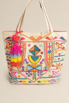 Boho Pattern Shoulder Bag with Pom Pom Tassel Magnetic closure with a single zip pocket, 2 slip pockets Plenty of space to carry your belongings. **Size Approx. 19" W x 15" H x 5.5" D** Tasseled Shoulder Bag For Daily Use, Daily Use Pouch Bag With Tassels, Bohemian Shoulder Bag With Zipper Closure, Bohemian Shoulder Bag With Zipper, Travel Tassel Shoulder Tote Bag, Daily Use Satchel Bag With Tassels, Tassel Double Handle Bag, Travel Tote Shoulder Bag With Tassels, Daily Use Shoulder Bag With Tassels And Double Handle