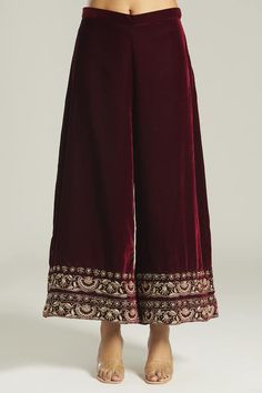 Maroon anarkali with front pleated details, floral pattern, metallic zardozi, aari embroidered front panel and sleeve borders. Paired with palazzo with embroidered borders. - Aza Fashions Velvet Traditional Wear For Diwali, Semi-stitched Dabka Palazzo Set For Reception, Traditional Velvet Kurta With Zari Work, Traditional Semi-stitched Velvet Kurta, Traditional Palazzo Set For Eid Reception, Velvet Sharara For Navratri Festival, Bollywood Style Dabka Palazzo Set For Reception, Eid Reception Dabka Palazzo Set, Festive Velvet Traditional Wear For Diwali