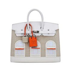 limited edition Hermes Birkin Faubourg 20 Sellier bag featured in Neige (Snow). This rare treasure is a crowning jewel to any Hermes collector.Exquisite craftmanship created in:Beton Matte Alligator White Swift and Clemence leather.The window awnings and clochette are Orange H Swift leather.Three window panels are Bleu Brume Chevre Mysore leather and the trim is Craie Swift leather.Precision details create the slight 3-D effect of the Hermes flagship on 24 Rue du Faubourg Saint-Honoré, Paris.The clochette plays on the iconic shopping bag with the tiret 'handles'.The sellier edge finalizes this beauty with clean, crisp lines.Produced in three colorways, the Snow is the most rare and sought after in the collection.It has commanded as high as $400,000.00 hammer price.NEW or NEVER . Comes with Rare Birkin Bag, Hermes Rare Bag, Tas Hermes Limited Edition, Rare Hermes Bags, Hermes Limited Edition Bag, Hermes Birkin Limited Edition, Paul Lacamera, Birkin Collection, Hermes Limited Edition