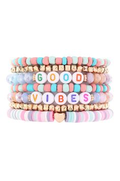 Stylish multi bead bracelets adorned in candy colored and gold beads along with a message... Trendy Heishi Beaded Bracelets As Gift, Trendy Heishi Beads Bracelet For Gift, Trendy Heishi Beads Bracelet As Gift, Trendy Stackable Name Bracelet With Round Beads, Trendy Stackable Name Bracelet, Trendy Beaded Bracelets With Letter Beads, Playful Gold Beaded Bracelets With Letter Beads, Trendy Heishi Beaded Bracelets, Trendy Stretch Bracelet With Letter And Heishi Beads