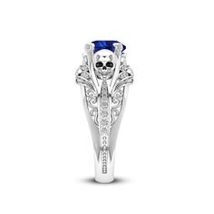 Tired of rings without any style? discover Blue Sapphire Skull Ring with a novel design and premium quality to provide you with the appeal you desire, dare to feel the difference. Formal Gothic Skull Ring, Gothic Skull Ring For Formal Occasions, Luxury Skull Ring As Gift, Formal White Gold Skull Ring, Elegant White Gold Skull Ring Gift, Elegant White Gold Skull Ring For Gift, Elegant Skull Ring In White Gold For Gift, Elegant Silver Skull Ring, White Gold Skull Ring As A Gift