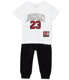 From Jordan&#x2C; this set features: pullover tee with a crew neck and short sleevesJordan jumpman graphic at front Matching solid jogger pantsPull-on styling Logo at left leg Cotton/polyesterMachine wash / tumble dry Imported. Sporty Crew Neck Playwear Set, Short Sleeve Sportswear Tops For Play, Sportswear Tops For Playwear, Spring Crew Neck Sets, Sportswear Sets With Crew Neck Letter Print, Sportswear Sets With Letter Print And Crew Neck, Sporty Cotton Sets With Graphic Print, White Relaxed Fit Playwear Sets, White Letter Print Crew Neck Sets