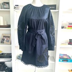 Adorable Cynthia Rowley Navy Blue Tulip Puffy Sleeves Dress With Matching Belt And Two Pockets. Beautiful Tulip Details In Sleeves And Around Hem. Fabric Is 98% Cotton And 2% Elastane Allowing And Creates A Flattering Effect When Worn. Pair With A Pair Of Wedges Or Flats Or Dress It Up With Heels. Size Xtra Small, But Fits More Like A Small Dry Clean Only Long Sleeve Blue Mini Dress With Lace Trim, Blue Long Sleeve Mini Dress With Lace Trim, Blue Lace Trim Dress For Fall, Spring Navy Long Sleeve Mini Dress, Navy Knee-length Dress For Spring, Navy Midi Dress For Spring Daywear, Navy Knee-length Spring Dress, Navy Knee-length Mini Dress For Spring, Navy Dress For Spring Brunch