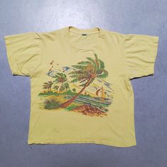 Vintage Souvenir Shirt, Vintage Graphic Print Crew Neck Top, Retro Crew Neck Tops With Screen Print, Vintage Crew Neck Shirt With Graphic Print, Vintage Cotton Crew Neck Top, Crew Neck Cotton Top With Vintage Print, Cotton Crew Neck Top With Vintage Print, Retro Short Sleeve T-shirt With Vintage Print, Vintage Yellow Crew Neck Shirt