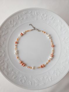 Orange Mixed color seed beads and pearl beads. Gift for Choker. Summer necklaces that you can present to yourself or your loved ones on special occasions. Elegant choker necklaces that you can use separately or together are 14 inches and have a 1.5 inch adjustable chain.   *There is no delivery to military areas. *Hawaii is only shipped via express shipping. (You are requested to choose express shipping.) *Puerto Rico shipments are not delivered via express. Shipping time is 6-14 business days. Apricot Beaded Round Bead Jewelry, Pearl Beaded Chain Beads As Gift, Colorful Pearl Beads For Gifts, Pearl Beaded Necklaces As Gift, Orange Pearl Necklace As A Gift, Orange Pearl Necklace As Gift, Orange Pearl Necklace For Gift, Orange Pearl Necklace For Gifts, Pearl White Beaded Chain Beads Gift