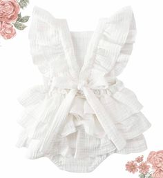 Dress your little princess in adorable style with our Floral Criss-Cross Romper! Perfect for playful days and special occasions, this romper combines comfort and charm in one delightful outfit. This romper features a vibrant floral print that's sure to catch the eye. The unique criss-cross back and layered ruffles add a touch of whimsy and sophistication, making your little girl look like a true princess. Envision your little one twirling and frolicking in this beautiful romper at a picnic, fami Baby Ruffle Romper, Ruffle Layered Dress, Layered Dress, Baby Comforter, Bubble Romper, Layer Dress, Girls Wardrobe, Romper Dress, Ruffle Sleeves