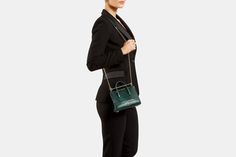 The Strathberry Nano Tote is defined by understated styling and the iconic Strathberry bar closure.Featuring an interior pocket, Strathberry branded hardware and a detachable chain shoulder strap.Made in Spain using the finest calf leather with a luxurious embossed croc finish. Mini Tote Bag, Bottle Green, Mini Tote, Black Tote Bag, Green Bag, Leather Mini, Mini Bag, Top Handle, Calf Leather