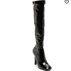 The Details Saint Laurent Elle 105mm Knee-High Boots Made In Italy Highlights Black Leather Patent Finish Panel Detailing Crystal Buckle Detail Gold-Tone Hardware Pull-On Style Square Toe Belted Opening Knee-High 105mm High Heel Composition Outer: Polyurethane 100%, Nylon 70%, Calfskin 25% Sole: Leather 100% Lining: Leather 100% Elegant Heeled Boots With 4-inch Heel For Night Out, Evening Patent Leather Knee-high Heeled Boots, Evening Knee-high Patent Leather Heeled Boots, Elegant Boots With 4-inch Heel For Night Out, Modern High Heel Boots For Night Out, Elegant Heeled Boots With Buckle Closure For Office, Elegant Office Heeled Boots With Buckle Closure, Modern High Heeled Boots For Night Out, Elegant Evening Boots With Buckle Closure