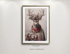 a deer with antlers on it's head is wearing a scarf and standing in front of a white wall