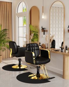 a black and gold hair salon chair in front of a mirror with two mirrors on the wall