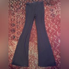 Never Worn Stretch Casual Flare Pants For Night Out, Casual Stretch Wide Leg Pants For Night Out, Purple Cargo Pants, Brown Flare Pants, Brown Flares, Wide Leg Yoga Pants, Stretch Jumpsuit, Grey Cargo Pants, Loose Fitting Pants