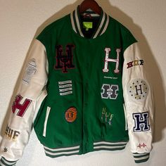 Celebrate Huf's 20th Anniversary In Style With This Varsity Jacket. Made For Men, The Jacket Features The Iconic Huf Brand On The Front And Offers A Regular Fit For Comfort. Green Embroidered Logo Outerwear For Streetwear, 20th Anniversary, In Style, Varsity Jacket, Mens Jackets, Jackets & Coats, Man Shop, For Men, Celebrities