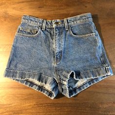 "Vintage 1990s American Apparel Jean Shorts High Waist Cuff Shorts Regular Fit   Medium Wash Wear Consistent with Age  Size 28 (Close to a Modern 26) Measurements (Flat Across) Waist: 13\" Rise: 12\" Hips: 19\" Length: 12\" Legs Opening: 11.5\" Made in USA" 80s Jean Shorts, 80s Jeans, Ck Jeans, Vintage Mom, Vintage Wrangler, Cuffed Shorts, Wrangler Jeans, Mom Shorts, Vintage Shorts