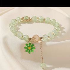 Green Crystal And Daisy Bracelet Hoco Accessories, Daisy Bracelet, A Bracelet, Green Crystal, Green Colour, Colorful Bracelets, Green Crystals, Pretty Jewellery, Girls Wear