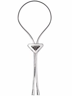 Silver leather brushed leather bolo tie from PRADA featuring logo plaque, adjustable fit and slide fastening. | Prada Brushed Leather Bolo Tie Silver Bolo Tie, Prada Necktie, Prada Bolo Tie, Bolo Tie Women Outfit, Prada Tie, Leather Toys, Gq Usa, Designer Aesthetics, Tie Jewelry