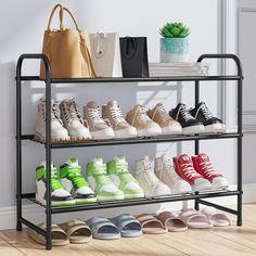 there is a rack with many pairs of shoes and bags on the shelf next to it