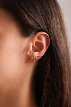 S P I R A L ∙ ⚘ ∙ E A R ∙ ⚘ ∙ C L I M B E R ∙ ⚘ ∙ E A R R I N G S Elevate your style with our stunning Spiral Ear Climber Earrings. These elegant earrings feature a unique climber design that gracefully trails up the earlobe, creating a mesmerizing and eye-catching effect. Versatile yet distinctive, they are the perfect accessory for any occasion, effortlessly blending modern sophistication with everyday wearability. ♡ * Material: High Quality Sterling Silver * Color Options: Available in Gold, Silver and Rose Gold. O T H E R ∙ ⚘ ∙ I N F O R M A T I O N * Luxurious Packaging: Your earrings will arrive in a beautifully crafted gift box, adding an extra touch of luxury to your purchase. ♡ * Whether you want to give yourself a gift or surprise your loved ones, our Spiral Ear Climber Earrings Spiral Wrap Pierced Earrings, Spiral Cartilage Earrings As Gift, Spiral Ear Cuff, Luxurious Packaging, Ear Climber Earrings, Silver Ear Climbers, Ear Climbers Earrings, Ear Climber, Ear Climbers