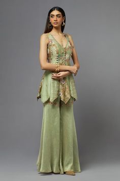 Green silk blouse with floral and thread embroidery. Comes with palazzo. - Aza Fashions Organza Palazzo Set With Floral Embroidery For Party, Party Organza Palazzo Set With Floral Embroidery, Party Palazzo Set With Floral Embroidery In Georgette, Summer Festive Organza Palazzo Set, Silk Sharara With Resham Embroidery Sleeveless, Elegant Pista Green Georgette Palazzo Set, Elegant Georgette Sharara For Summer, Summer Festive Palazzo Set With Intricate Embroidery, Elegant Summer Palazzo Set With Intricate Embroidery