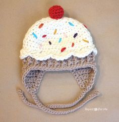 a crocheted ice cream hat with sprinkles