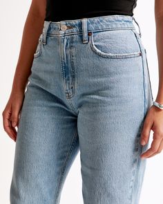 Elevate your denim collection with the Abercrombie & Fitch Women's Curve Love High Rise 90s Relaxed Jean. Perfectly tailored for those who desire both style and comfort, these jeans are a must-have for any fashion-forward wardrobe.

- Size: 32 LONG
- Color: Medium Wash
- Material: Cotton, Elastane
- Gender: Female
- Fit: High rise, 10.5” rise; fitted at waist and hips, relaxes at thigh into a full-length leg
- Features: Clean hem, vintage stretch fabric for comfort, Curve Love fit to minimize wa Everyday Medium Wash Flare Jeans With Frayed Hem, Everyday Medium Wash Bottoms With Straight Hem, Medium Wash Straight Hem Jeans, Classic Flare Jeans With Frayed Hem For Everyday, Everyday Straight Bottoms With Frayed Hem, Fitted Cutoff Everyday Jeans, Straight Bottoms With Frayed Hem For Everyday, Cutoff Jeans For Everyday Fall Wear, Everyday Cutoff Jeans For Fall