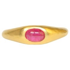 This handcrafted gypsy ring is a true standout, featuring a radiant 0.60ct oval cabochon ruby set in luxurious 22K yellow gold. Its matte hammered finish complements the vibrant ruby, making it a perfect piece for the discerning jewelry lover. The ring’s tapered band with rounded inner edges ensure both style and comfort for all-day wear. Our ruby gypsy ring makes a statement on its own, but also pairs beautifully with other gypsy rings for a stacked look. - Size: 6 1/4 - Center Stone: 0.60ct ov 22k Gold Ring, Ruby Set, Light Blue Sapphire, Modern Engagement Rings, Modern Ring, Sapphire Stone, Three Stone Rings, Gold Engagement Rings, Oval Cabochon