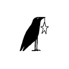 a black bird holding a star in its beak