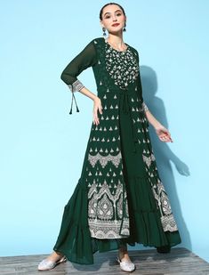 * Women Lovely Green Georgette Fluid Tie-Up Ethnic Dress * Dress Details:- * Green floral embroidered a-line dress * Round neck * Three-quarter, regular sleeves * Embroidered detail * Maxi length in flared hem * Georgette fabric *Fabric:- Georgette  *Wash Care:- Hand wash AVAILABLE IN 7 SIZES THEY ARE IN FOLLOWING MEASUREMENTS IN INCHES:- XXS:- Bust-32/To Fit Waist-26/Length-50/Hip-36 XS:- Bust-34/To Fit Waist-28/Length-50/Hip-38 S:- Bust-36/To Fit Waist-30/Length-50/Hip-40 M:- Bust-38/To Fit Wa Traditional Embroidered Maxi Dress For Diwali, Bollywood Style Georgette Dress With Intricate Embroidery, Fitted Bohemian Gown For Transitional Seasons, Bohemian Wedding Dress For Diwali, Semi-stitched Long Sleeve Bohemian Dress, Bohemian Dress With Cutdana In Traditional Drape, Long Dress With Intricate Embroidery For Festive Occasions, Semi-stitched Dresses With Intricate Embroidery For Festive Occasions, Semi-stitched Festive Dresses With Intricate Embroidery