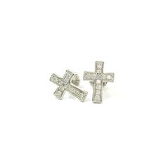 Material: Crafted from the radiant beauty of 14K solid gold, these exquisite cross diamond stud earrings exude timeless elegance and sophistication. Weight: Weighing approximately 1.05 grams, these earrings offer a perfect balance of substance and comfort, ensuring a delightful wearing experience. Diamonds: Adorned with 22 natural diamonds totaling 0.11 carats, these earrings dazzle with a brilliant sparkle. Each diamond is carefully selected to enhance the overall allure of the design. Design: Featuring a delicate cross motif, these stud earrings seamlessly combine modern style with classic charm, making them a standout addition to any jewelry collection. Craftsmanship: Meticulously crafted by skilled artisans, each diamond is set with precision, showcasing impeccable craftsmanship and at White Diamond Pierced Earrings Gift, White Pierced Diamond Earrings As Gift, White Pierced Diamond Earrings Gift, Gift White Pierced Diamond Earrings, Elegant Cross Earrings For Everyday, Elegant Everyday Cross Earrings, Everyday Elegant Cross Earrings, Diamond Cross Earrings As Gift, White Gold Cross Earrings For Gift