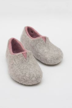 Felted slippers for women - excellent housewarming or a birthday gift. Handmade in Europe These felted slippers are fully handmade, using just warm water and natural not scented soap. Please click here if you would like to purchase men's slippers size: https://www.etsy.com/listing/176735419/felted-slippers-mens-slippers-womens?utm_source=etsyrank&utm_medium=api&utm_campaign=api Available these colors: Grey and white Grey and black Grey and navy blue Grey and sky blue Grey and green Grey and rose Winter Felt Slip-on Clogs, Casual Closed Toe Felt Slippers, Slip-on Felt Slippers For Indoor Use, Comfortable Felt Clogs With Round Toe, Winter Indoor Felt Slippers, Handmade Comfortable Slippers With Round Toe, Indoor Slip-on Felt Slippers, Winter Felt Slippers With Soft Sole, Felt Slip-on Slippers With Soft Sole