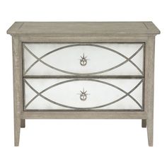 a white and silver chest with two drawers