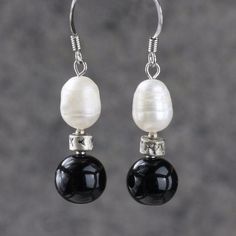 Pearl simple black and white drop earrings  bridesmaids gifts Free US Shipping handmade anni designs by AnniDesignsllc on Etsy https://www.etsy.com/listing/152386503/pearl-simple-black-and-white-drop Black Sterling Silver Pearl Earrings For Formal Occasions, Black Sterling Silver Jewelry With Pearl Drop, Gift Black Round Pearl Earrings, Black Pearl Earrings As A Gift, Black Drop Pearl Earrings For Gift, Black Pearl Drop Earrings For Gift, Black Pearl Earrings For Gift, Black Drop Pearl Earrings As A Gift, Black Sterling Silver Pearl Earrings Gift