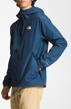 Rainy season has met its match with this hooded jacket crafted from recycled fabrics that offer breathable, lightweight protection from wind and rain. 28 1/2" length (size Medium)   Stand collar; drawcord hood   Durable water-repellent (DWR) finish   PFC-free, durable water-repellent coating is free of per- and poly-fluorinated chemicals, some of which can be harmful to the environment   Secure zip pocket holds cash or key   Lined   100% recycled nylon   Machine wash, tumble dry   Imported Recycled Polyester Windbreaker With Drawstring Hood For Outdoor, Blue Waterproof Nylon Hooded Jacket, Blue Weatherproof Parka For Outdoor Activities, Blue Waterproof Hooded Jacket, Blue Waterproof Hooded Jacket For Fall, Blue Waterproof Hooded Jacket With Long Sleeves, Blue Nylon Parka With Adjustable Hood, Outdoor Recycled Polyester Windbreaker With Drawstring Hood, The North Face Outdoor Hooded Jacket With Adjustable Hood