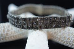 "This is the perfect option for those who like cool, unique jewelry and the luxury, shine of sterling silver . This bracelet is well made, cute and/or elegant in design, and very desirable. The bracelet is decorated with gray and clear cz . The clasp is in good working condition. The clasp is with safety hook. This bracelet is hard to find. The Wachenheimer Brothers Company of Providence, Rhode Island, started business in 1907. The bracelet is marked on the back of the catch Sterling Diamonbar P Vintage Silver Diamond Bracelet With Single Cut Diamonds, Art Deco Silver Diamond Bracelets, Art Deco Diamond Bracelet In Silver, Art Deco Silver Diamond Bracelet, Art Deco Silver Bracelets With Single Cut Diamonds, Art Deco Silver Bracelet With Single Cut Diamonds, Art Deco Silver Bracelets With Diamond Accents, Silver Diamond Bracelet For Anniversary In Art Deco Style, Silver Tennis Bracelet With Black Diamonds For Formal Occasions