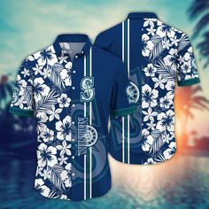 MLB Seattle Mariners Hawaiian Shirt Swing Into Summer For Sports Fans  It’s the perfect combination of Hawaiian style and MLB fandom. These unique MLB Hawaiian shirts are a must-have for football enthusiasts. Show your team spirit in a fun and tropical way by the beauty of Hawaii. Made from high-quality materials, they provide comfort and breathability, keeping you cool during game days or outdoor activities. Stand out from the crowd and show your love for both football and tropical vibes. Flower Hawaii, Hawaiian Outfit, Summer Attire, Blue Hawaiian, Seattle Mariners, Hawaiian Style, Aloha Shirt, Hawaii Shirt, Tropical Vibes